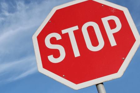 Stop sign with blue sky background